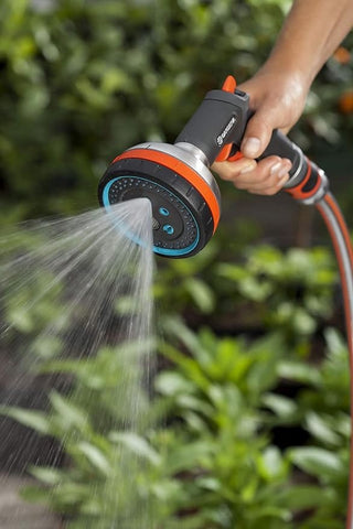 Gardena multi sprayer showering a bed of green plants