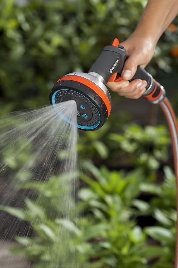 Gardena multi sprayer showering a bed of green plants