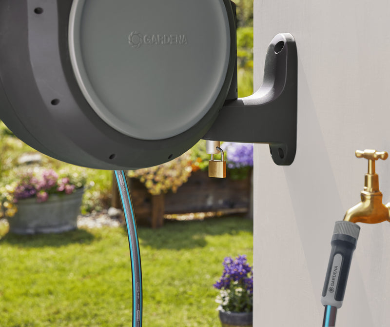 Gardena RollUp reel on its wall bracket beside a faucet